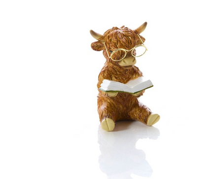 Highland Cow Reading A Book Ornament