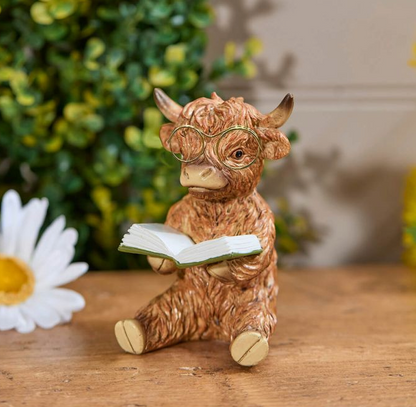 Highland Cow Reading A Book Ornament