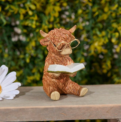 Highland Cow Reading A Book Ornament